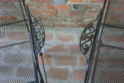 Pair of Vintage Wrought Iron Mesh Patio Glider Chairs