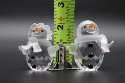 Swarovski Crystal Snowman & Snow Woman Figurines