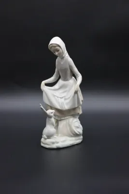 Lladró Rabbit’s Food Girl with Bunny Porcelain Figurine
