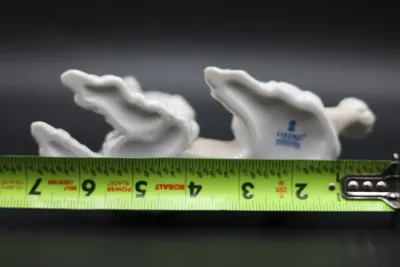 Lladró Reclining Poodle with Pink Bow Porcelain Figurine