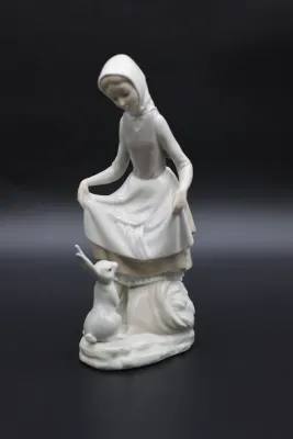 Lladró Rabbit’s Food Girl with Bunny Porcelain Figurine