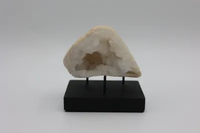 Natural Quartz Geode on Black Display Stand