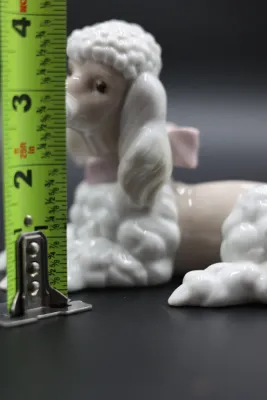 Lladró Reclining Poodle with Pink Bow Porcelain Figurine
