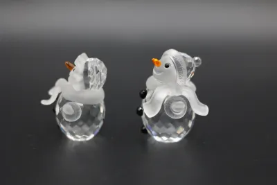 Swarovski Crystal Snowman & Snow Woman Figurines