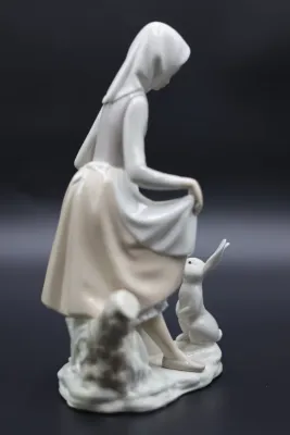 Lladró Rabbit’s Food Girl with Bunny Porcelain Figurine