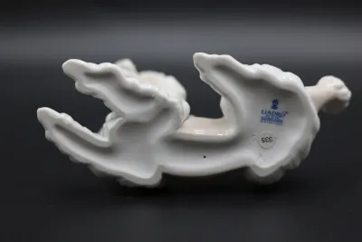 Lladró Reclining Poodle with Pink Bow Porcelain Figurine