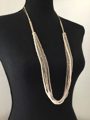 Beautiful, multi strand cream glass bead necklace