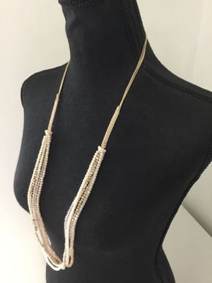 Beautiful, multi strand cream glass bead necklace