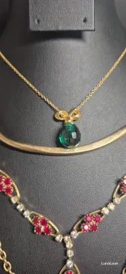 Lot 4 Gold tone Necklaces