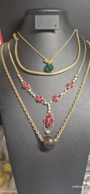 Lot 4 Gold tone Necklaces