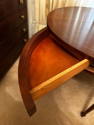 Sale Photo Thumbnail #7: Tilt top card table that comes with two swing action drawers. This table boasts of intricately crafted wood string inlay.on its surface and stands on elegant style legs. This tilt top feature makes it easy to store and move around.