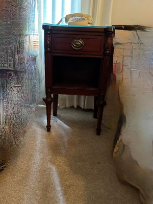 Sale Photo Thumbnail #41: vintage mahogany-finish wooden nightstand featuring a single upper drawer with classic brass-toned hardware and an open lower shelf.