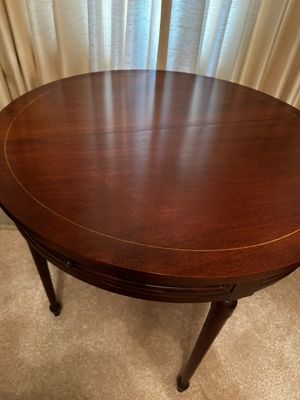 Sale Photo Thumbnail #5: Tilt top card table that comes with two swing action drawers. This table boasts of intricately crafted wood string inlay.on its surface and stands on elegant style legs. This tilt top feature makes it easy to store and move around.