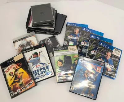 Empty Video Game Cases, Some with Sleeves