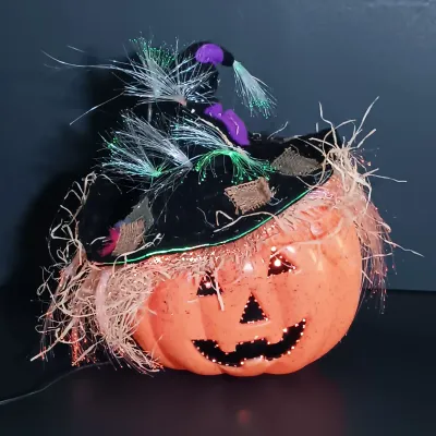 LOT 142: Vintage William Fuld Parker Bros Ouija Board, Fiber Optic Pumpkin, The Craghold Crypt by Edwina Noone & More