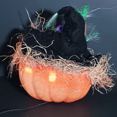 LOT 142: Vintage William Fuld Parker Bros Ouija Board, Fiber Optic Pumpkin, The Craghold Crypt by Edwina Noone & More
