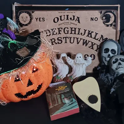 LOT 142: Vintage William Fuld Parker Bros Ouija Board, Fiber Optic Pumpkin, The Craghold Crypt by Edwina Noone & More