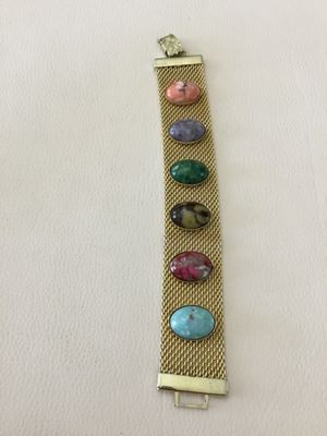 Vintage Sarah Coventry Sonnet Gold tone, mesh bracelet, featuring a row of six vibrant side colored cabochons