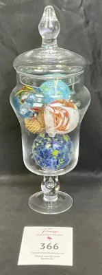 Clear glass pedestal, apothecary jar with a finial lid