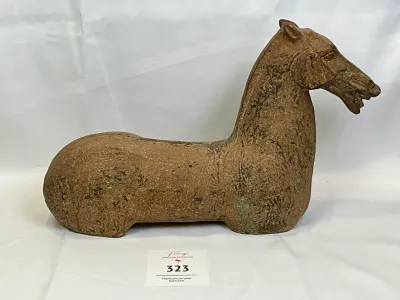 Weathered, legless horse sculpture, Han dynasty style