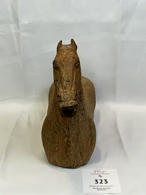Weathered, legless horse sculpture, Han dynasty style