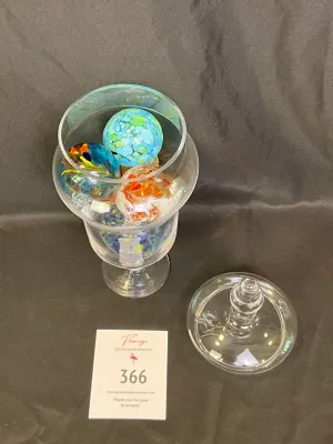 Clear glass pedestal, apothecary jar with a finial lid