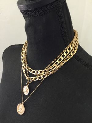 Super cute gold tone, multistrand statement, necklace