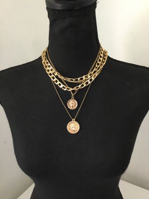 Super cute gold tone, multistrand statement, necklace