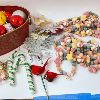 Assorted Christmas Ornaments, Garlands, and Red Metal Tub