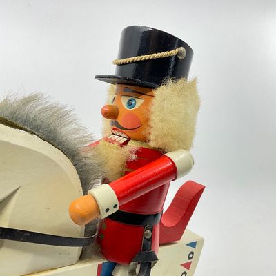 Vintage Wooden Nutcracker on Rocking Horse