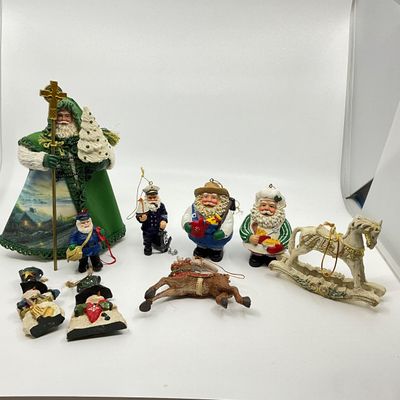 3267 Thomas Kincade Santa with various Santa Ornaments
