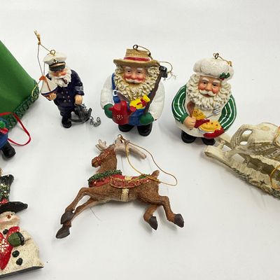 3267 Thomas Kincade Santa with various Santa Ornaments
