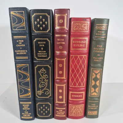 LOT 119U: Signed First Edition A Time of Change from The Franklin Library, The Second Coming First Edition, Vanity Fair & More