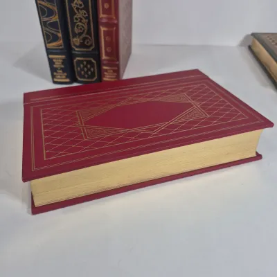 LOT 119U: Signed First Edition A Time of Change from The Franklin Library, The Second Coming First Edition, Vanity Fair & More
