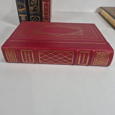 LOT 119U: Signed First Edition A Time of Change from The Franklin Library, The Second Coming First Edition, Vanity Fair & More