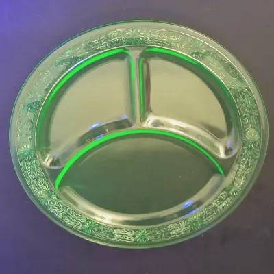 LOT 199: Uranium Glass Daisy Pattern Divided Plates