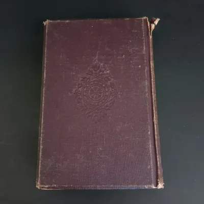 LOT 206: Leatherbound Bronte's Poems, Mini Leatherbound Christmas Carol, Longfellow's Prose Works 1866 and Whittier's...