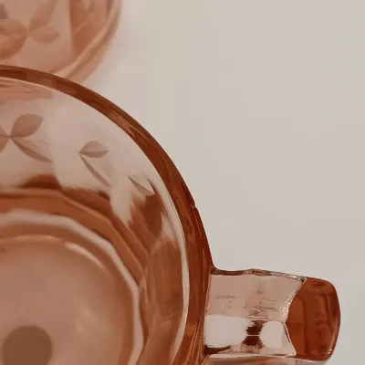 LOT 216: Collection of Pink Depression Glass - Pitcher, Juicer, Creamer and Sugar Bowl