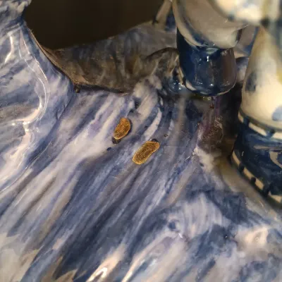 LOT 227: Bombay Blue and White Porcelain Figurine