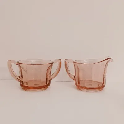 LOT 216: Collection of Pink Depression Glass - Pitcher, Juicer, Creamer and Sugar Bowl