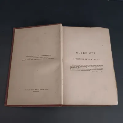 LOT 206: Leatherbound Bronte's Poems, Mini Leatherbound Christmas Carol, Longfellow's Prose Works 1866 and Whittier's...