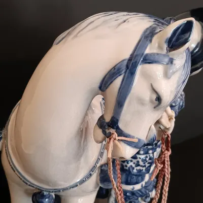 LOT 227: Bombay Blue and White Porcelain Figurine