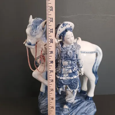 LOT 227: Bombay Blue and White Porcelain Figurine