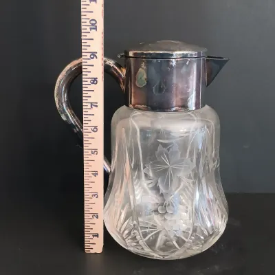 LOT 231: Vintage Crystal Pitcher with Metal Bird Claw Ice Tongs & Glass Ladles