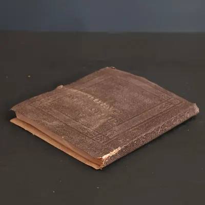 LOT 206: Leatherbound Bronte's Poems, Mini Leatherbound Christmas Carol, Longfellow's Prose Works 1866 and Whittier's...