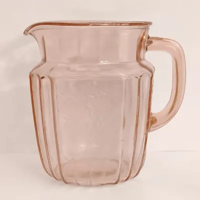 LOT 216: Collection of Pink Depression Glass - Pitcher, Juicer, Creamer and Sugar Bowl