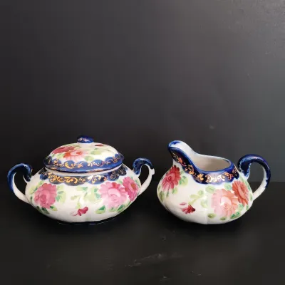 LOT 232: Bombay Rosette Salad Plates with Porcelain Tea Pot, Creamer, Sugar Bowl & Tea Cup