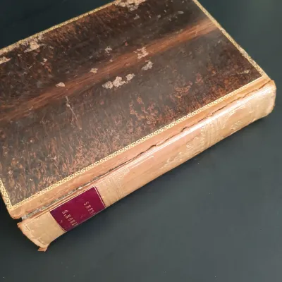 LOT 206: Leatherbound Bronte's Poems, Mini Leatherbound Christmas Carol, Longfellow's Prose Works 1866 and Whittier's...