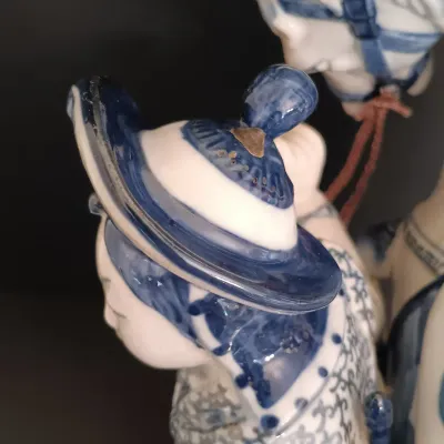 LOT 227: Bombay Blue and White Porcelain Figurine