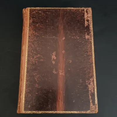 LOT 206: Leatherbound Bronte's Poems, Mini Leatherbound Christmas Carol, Longfellow's Prose Works 1866 and Whittier's...